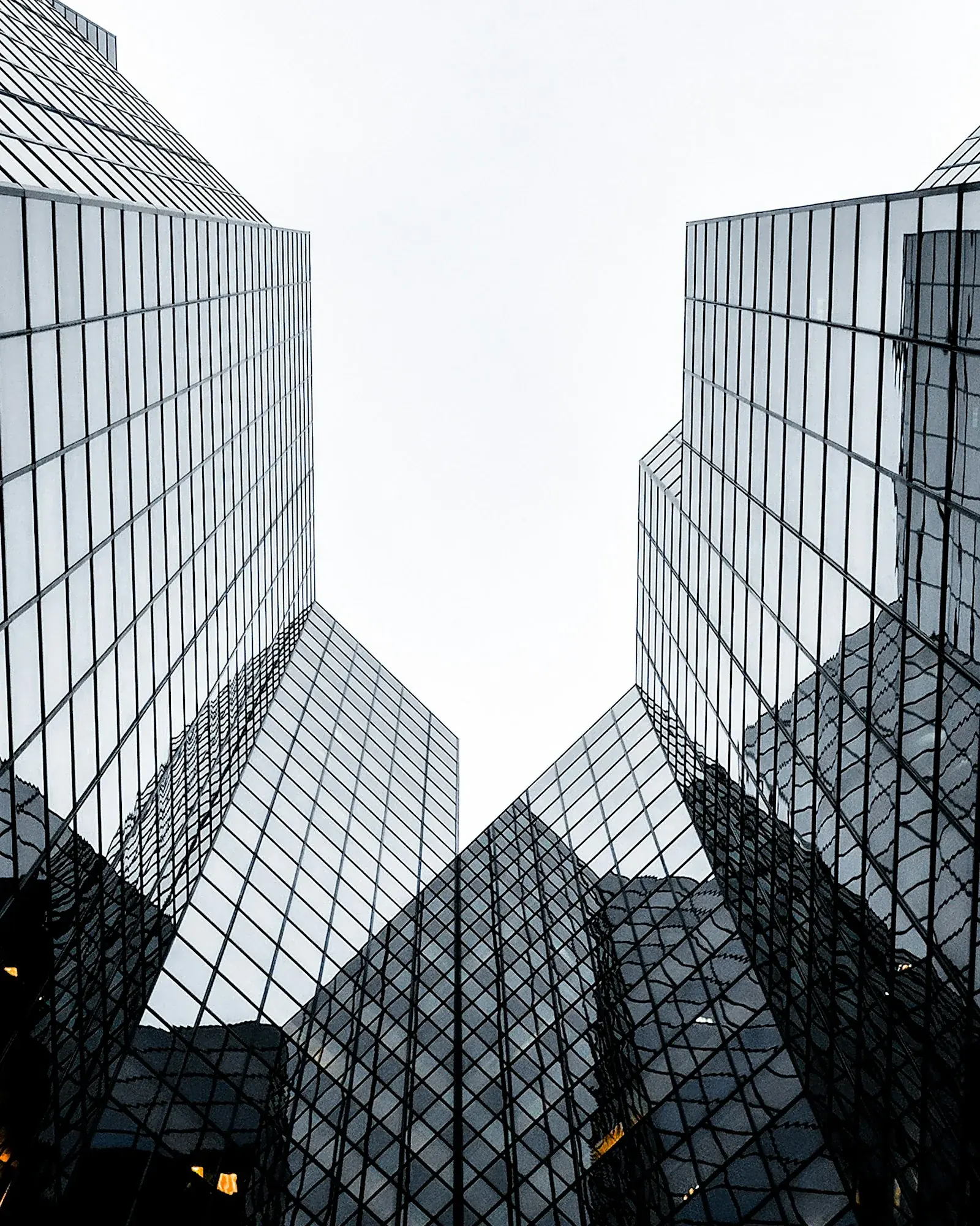 Glass office towers seen from below